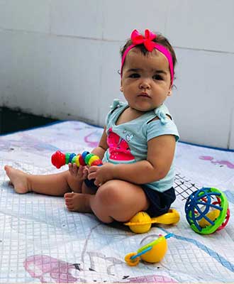 Criança em equilíbrio sentada - Berçário Uniepre